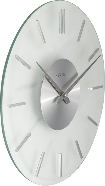 NeXtime Clocks wall clock with a 26 cm aluminum and glass design featuring a modern stripe pattern.