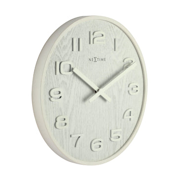 NeXtime Clocks wooden wall clock, 35 cm diameter, natural wood finish, 'Wood Wood Medium' design, showing the left side of the clock.