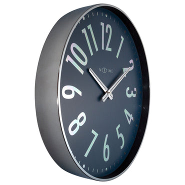 NeXtime Clocks Alchemy wall clock, 40cm metal design, silent operation, showing the left side with black and metal finish.