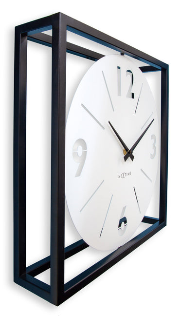 NeXtime black and white metal wall clock, 40x40x9.5 cm, with a modern frame design, showing the clock face with minimalist style