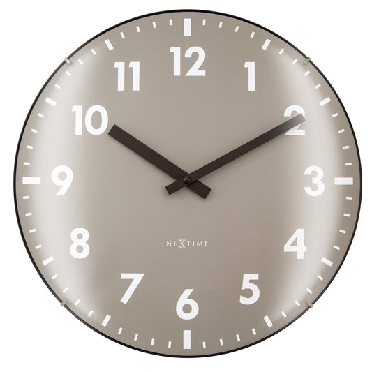 NeXtime Duomo wall clock with 35cm domed glass lens, silent mechanism, featuring a sleek modern design and black clock hands.