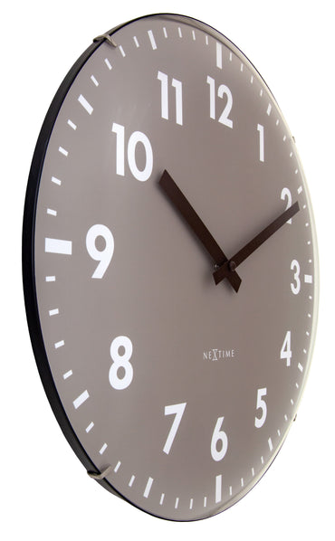 NeXtime Duomo wall clock with 35cm domed glass lens, silent mechanism, black frame, and white clock face.
