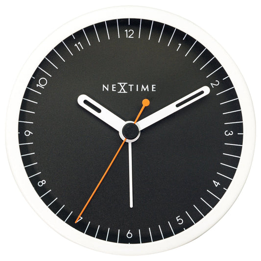 Small NeXtime metal table alarm clock with light function, silent operation, measuring 9x9x7.5cm, front view.