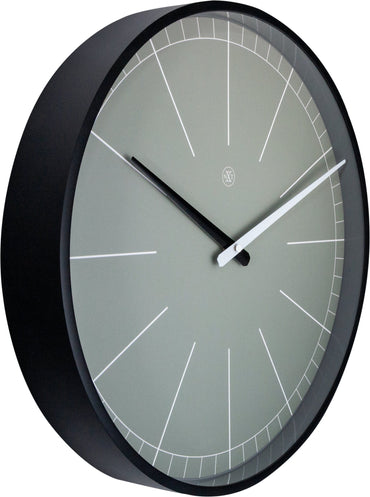 Gray NeXtime wall clock, 40 cm plastic clock with a minimalist design, showing the left side of the clock face.