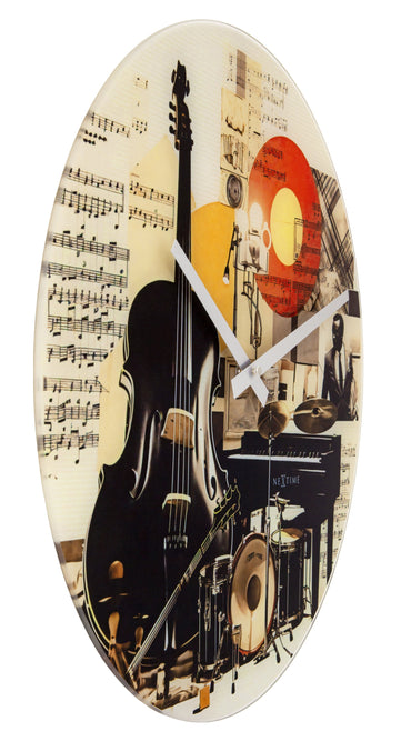 NeXtime wall clock with 43cm multicolor glass face and silent mechanism, featuring a blue design and left-side view.