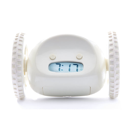 White Clocky alarm clock on wheels by NeXtime Clocks, featuring a playful design and digital display.