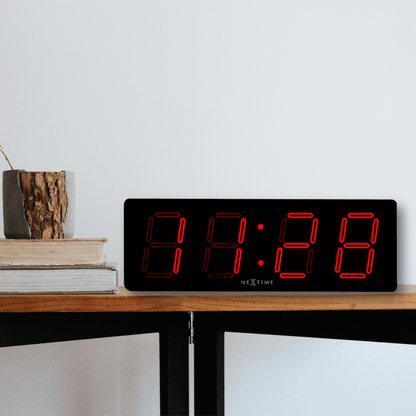 NeXtime Big D wall clock, plastic, 51.5 x 18 x 4.5 cm, with a modern design suitable for wall or table display.