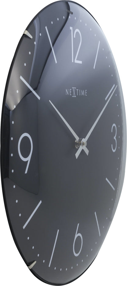 NeXtime Clocks 35cm Basic Dome wall clock with dome glass, showing a sleek minimalist design and left-side view.