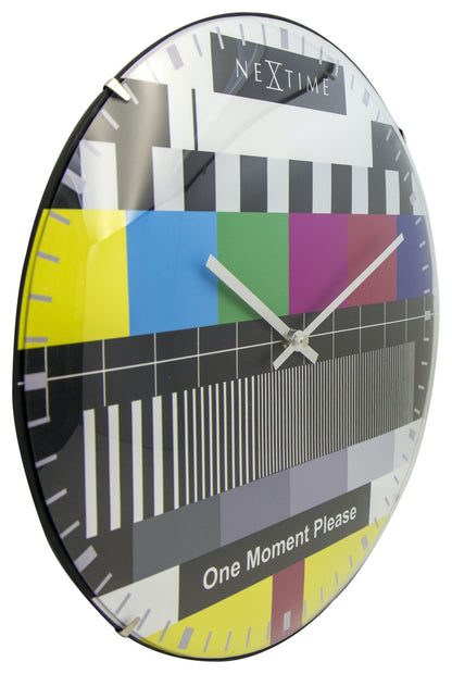 NeXtime Clocks wall clock with a 35 cm dome glass design, featuring a sleek modern look and left-side view.