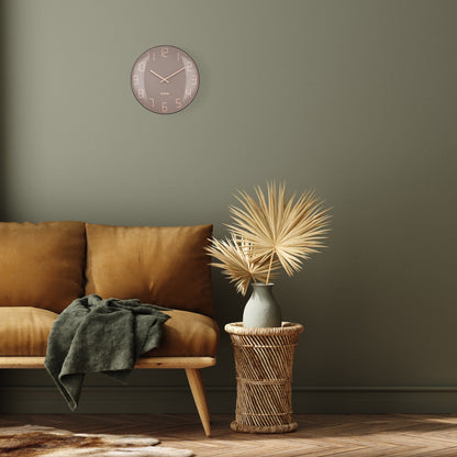 NeXtime Clocks wall clock with 35cm domed glass lens, silent movement, and modern design in a stylish interior setting.