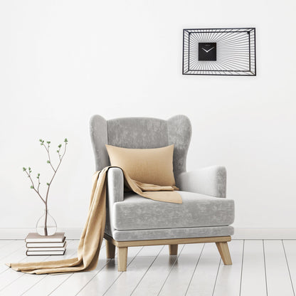 Large black metal wall clock by NeXtime Clocks, 70x45x15cm, with silent movement, suitable for modern interior decor.