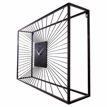 Large black metal wall clock by NeXtime, 70x45x15cm, with silent movement, shown from the right side.