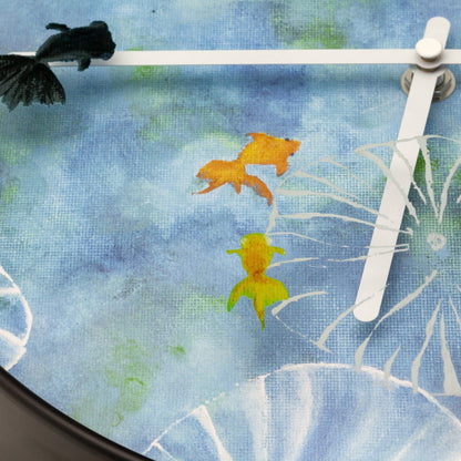 Blue plastic NeXtime Clocks wall clock, 30cm with silent movement, featuring a pond design.