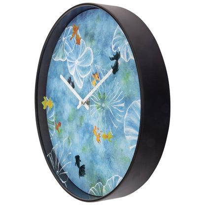 Blue plastic wall clock with silent mechanism, 30cm diameter, featuring pond-themed design by NeXtime Clocks.