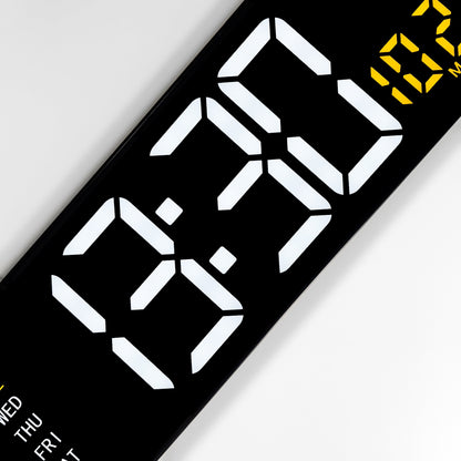 NeXtime Super Digi digital wall clock in black with large LED display, measuring 38.8x12.9x3.2cm, made of durable ABS.