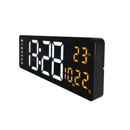 Black NeXtime Super Digi digital wall clock with large display and sleek design, showing time on its right side.