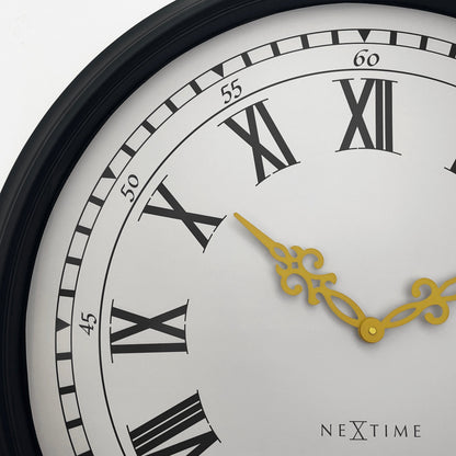 Large black and grey plastic wall clock by NeXtime, 76cm diameter, featuring modern design and clear time display.
