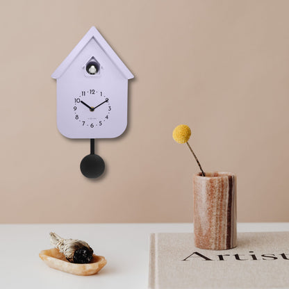 NeXtime Wall Clock with pendulum and cuckoo, 21.5x41.5x8.5cm, featuring Twitter design and decorative clock face.