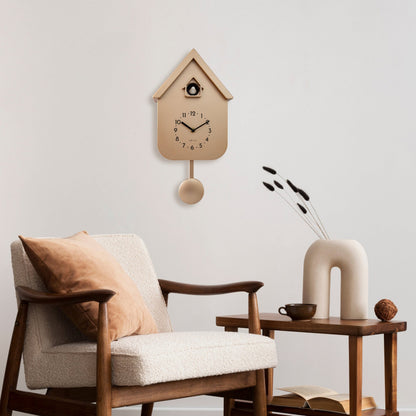 NeXtime Wall Clock with pendulum and cuckoo design, measuring 21.5x41.5x8.5cm, featuring Twitter-themed face and decorative elements.