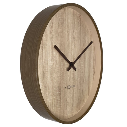 NeXtime Oslo wall clock with a 30cm dark and light brown plastic frame, silent operation, shown from the left side.