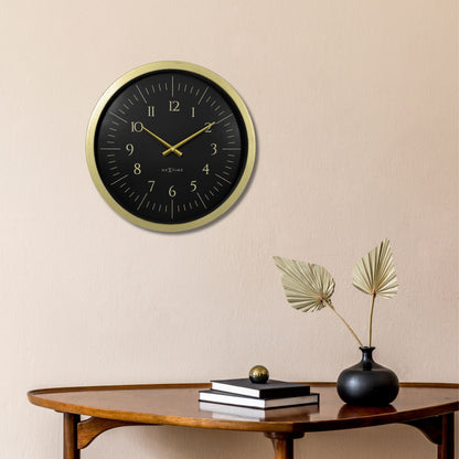 NeXtime Galaxy wall clock, 40cm diameter, black and white plastic design with a cosmic galaxy pattern.
