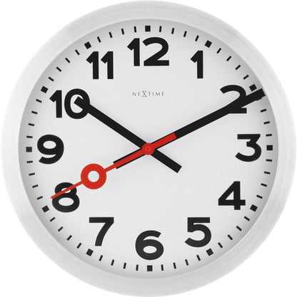 NeXtime Clocks aluminum station numbers wall or table clock with modern design and clear numeric display.
