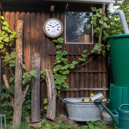NeXtime Clocks garden wall clock with weatherproof metal frame, 40.5 cm diameter, in hyacinth color, suitable for outdoor use