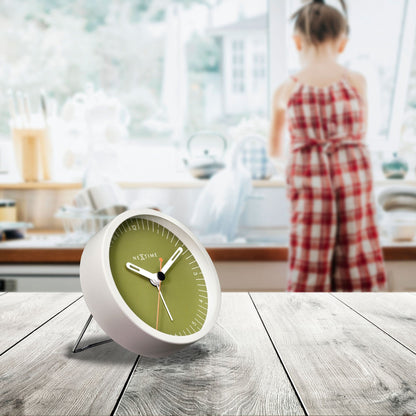 Small NeXtime Clocks table alarm clock with silent operation and light function, measuring 9x9x7.5cm, metal finish