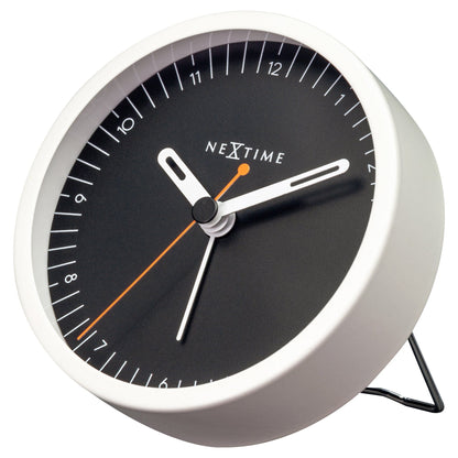 NeXtime small metal table alarm clock with light function, silent operation, measuring 9x9x7.5cm, viewed from the right side.