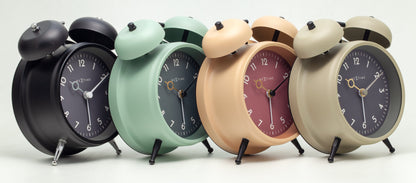 NeXtime Golden Hour alarm clock with metallic finish, 12x14x6cm, featuring a sleek design and easy-to-read clock face.