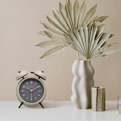 NeXtime Golden Hour alarm clock with metal frame, 12x14x6cm, featuring a sleek design and modern time display.