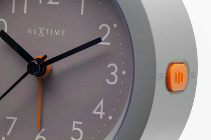 NeXtime Circle alarm clock with silent light dial, 10.5cm x 3.6cm, modern design for bedside or desk use