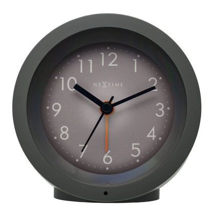 NeXtime Circle alarm clock with silent light dial, 10.5cm x 3.6cm, featuring a modern round design and easy-to-read display.