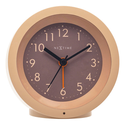 NeXtime Circle alarm clock with light dial, silent operation, 10.5cm tall and 3.6cm wide, modern tabletop design.