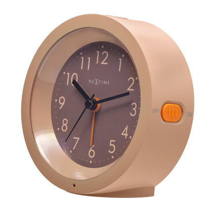 NeXtime Circle alarm clock with silent light dial, 10.5cm by 3.6cm, displayed from the right side.