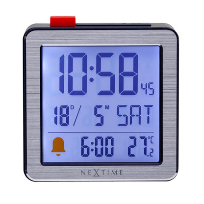 NeXtime Mini digital table alarm clock with metal and ABS casing, compact 6x6.4x2.1cm, front view.