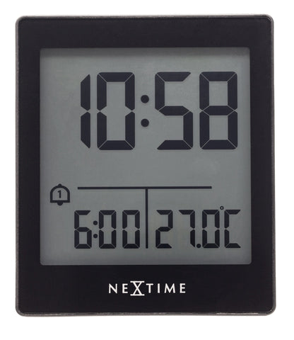 NeXtime digital table alarm clock with LED display, compact size, black and white design, and "Wake Up" label.