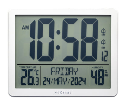NeXtime alarm clock with digital display, weather station features, ABS construction, compact 17.3x14x2.7cm design, front view