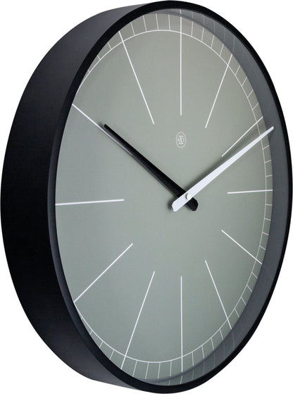 Gray NeXtime wall clock, 40 cm plastic clock with a minimalist design, showing the left side of the clock face.
