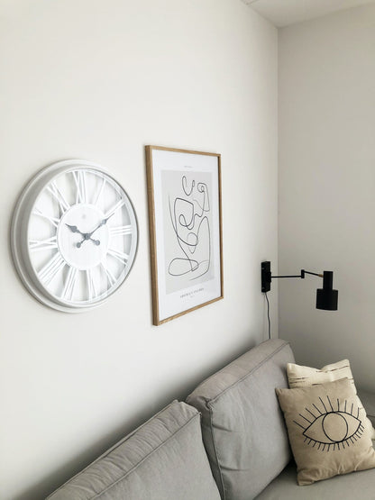 NeXtime Clocks wall clock with 51 cm plastic frame and Quebec design, featuring a modern, stylish appearance.
