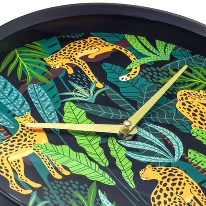NeXtime Clocks Urban Jungle wall clock, 30 cm plastic design with jungle-inspired pattern and detailed close-up.