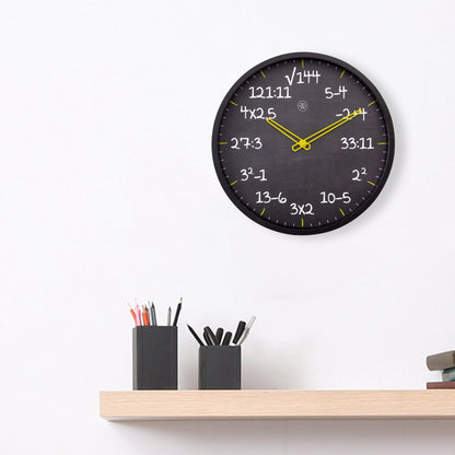 NeXtime Clocks 30cm silent plastic wall clock with "Maths" design, featuring a modern, minimalist style perfect for classrooms or home.