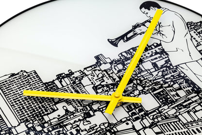 NeXtime Clocks Trumpet City wall clock, 40 cm with glass and metal frame, featuring a detailed trumpet city design.