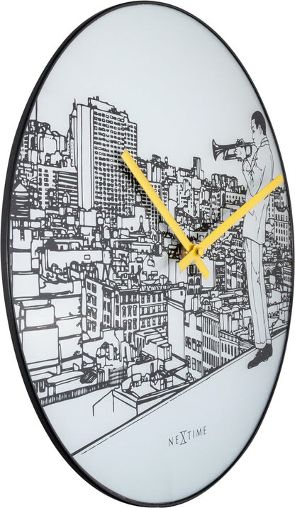 NeXtime Clocks wall clock with 40 cm diameter, glass and metal trumpet city design, shown from the left side.
