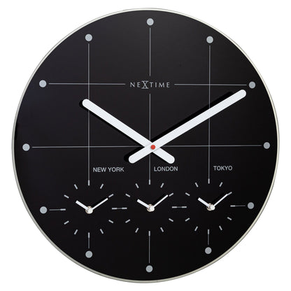 NeXtime Clocks Big City wall clock, 43cm silent glass clock with black hands and modern design, front view.