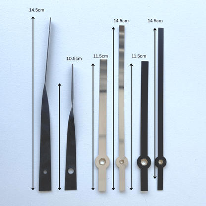 NeXtime Clocks clock hands set M with silent movement, showing detailed black and white clock hands for precise timekeeping.