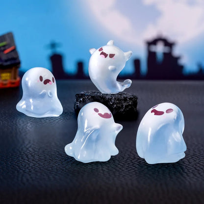 Six glow-in-the-dark ghost miniatures from Florazo NL, 2.5 to 3.5 cm tall, perfect for spooky decorations or crafts.