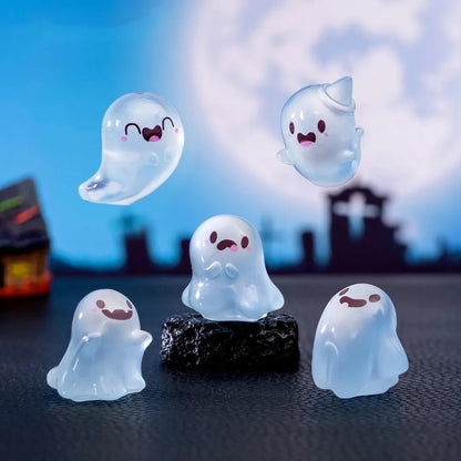 Six mini glow-in-the-dark ghost figurines from Florazo NL, measuring 2.5 to 3.5 cm, with spooky glowing features.