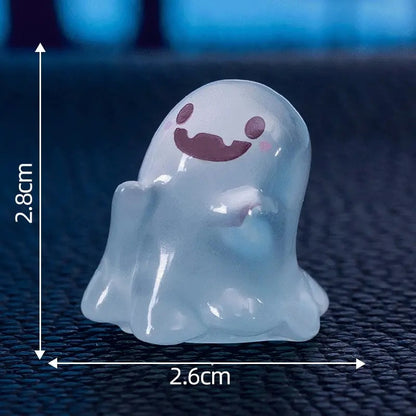 Six miniature glow-in-the-dark ghosts from Florazo NL, measuring 2.5 to 3.5 cm, with ghostly features in the image.